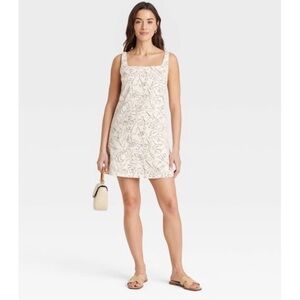 Mini Floral Dress pockets lined. A new day